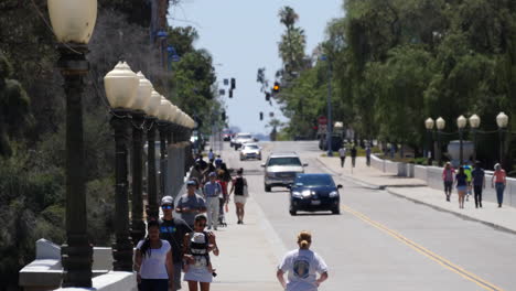 California-Jogger-And-Pedestrians-On-Sidewalk