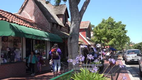 California-Solvang-Sidewalk-And-Flowers-With-Pedestrians