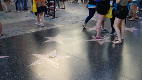 Los-Angeles-Tourist-Feet-And-Legs-On-The-Hollywood-Walk-Of-Fame