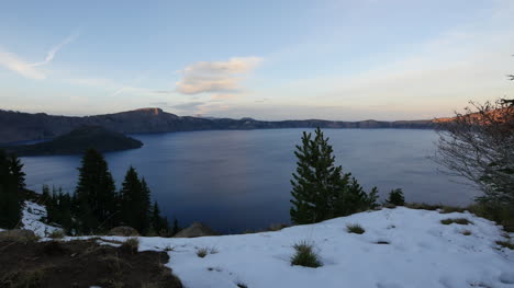 Oregon-Crater-Lake-In-Late-Evening-With-Snow-In-Foreground