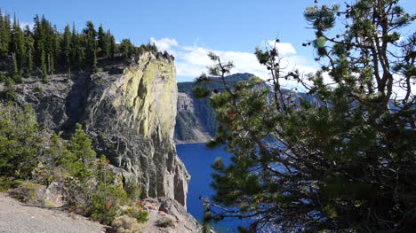Oregon-Crater-Lake-Tree-And-Green-Cliff-Pan-And-Zoom
