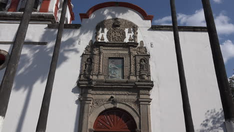 Mexico-Tlaquepaque-Door-Of-Parish-Church-With-Pigeon-Zoom-In