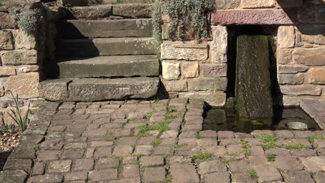 France-Steps-And-Water-On-Stone-Slab