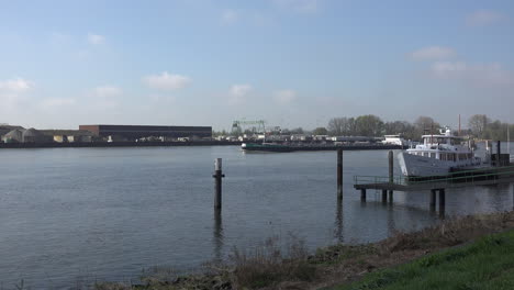 Netherlands-River-Lek-Barge-And-Pleasure-Boat