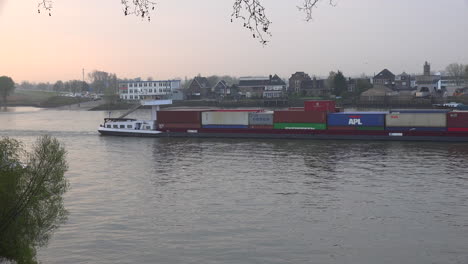 Netherlands-Container-Barge-On-Lek-River-At-Dawn-Time-Lapse