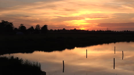 Netherlands-Sunset-Canal-With-Reflections-Pan-Right