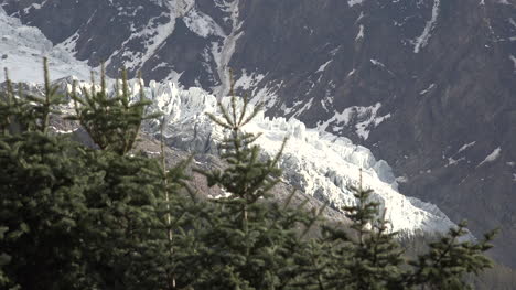 France-Mont-Blanc-Detail-Of-Glacier-With-Evergreen-Trees