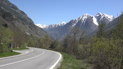Italy-Snowcapped-Peak-Above-Alpine-Highway