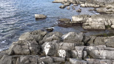 Croatia-Jumble-Of-Rocks-At-Low-Tide-Splash