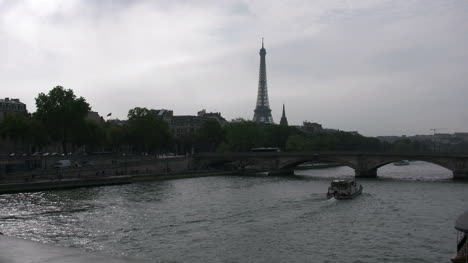 Paris-Eiffel-Tower-from-Paris-Pont-Alexandre-III-with-boat-on-river