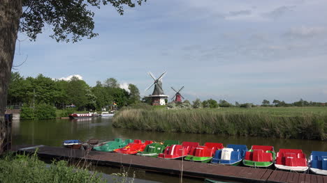Germany-colorful-boats-and-zooms-in-to-windmills