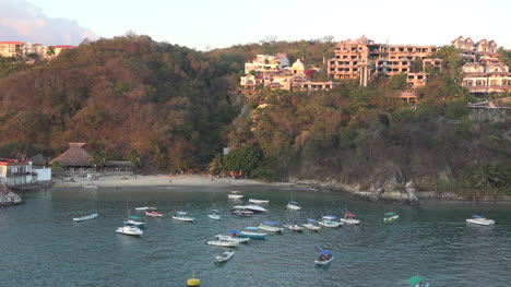 Mexico-Huatulco-houses-and-boat-harbor-evening