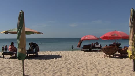 Cambodian-beach-with-umbrellas