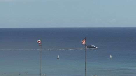 Waikiki-flags-sea-and-boat
