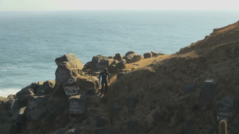 Chile-walking-down-a-cliff-at-Punta-Lobos