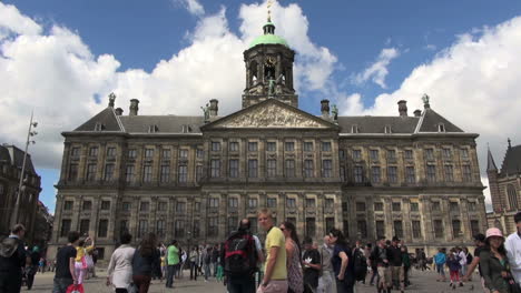 Netherlands-Amsterdam-dam-square-clouds-roll-over-palace-clock-tower