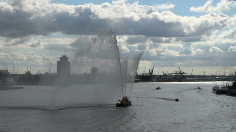 Netherlands-Rotterdam-three-spigots-throw-mist-from-water-boat-2