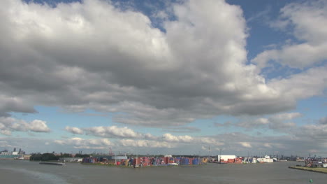 Netherlands-Rotterdam-clouds-over-colorful-containers-in-ship-yard
