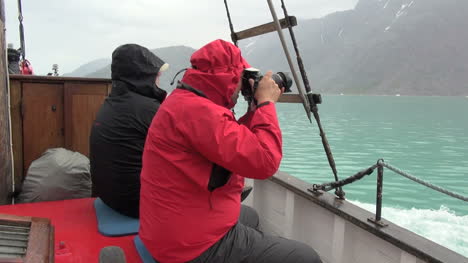 Greenland-ice-fjord-photographer-in-red-s43