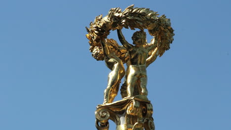 Germany-Berlin-Tiergarten-golden-cherub-sculpture-atop-monument