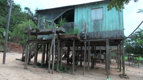 Brazil-Boca-da-Valeria-hammocks-under-house-on-stilts
