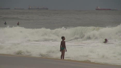 Rio-de-Janeiro-Ipanema-Beach-boy-and-wave
