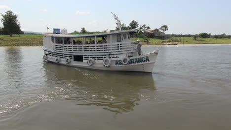 Brazil-Amazon-backwater-near-Santarem-boats-backing-up-s