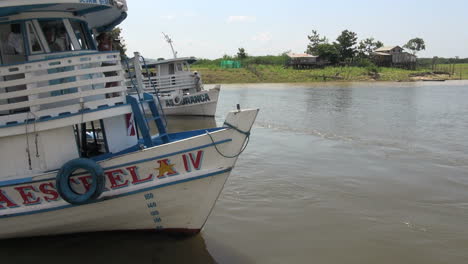 Brazil-Amazon-backwater-near-Santarem-boats-comming-along-side-s
