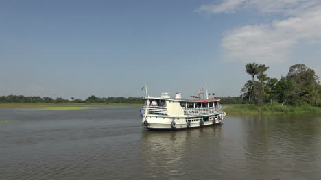 Brazil-Amazon-backwater-river-boat-reaching-shore-s