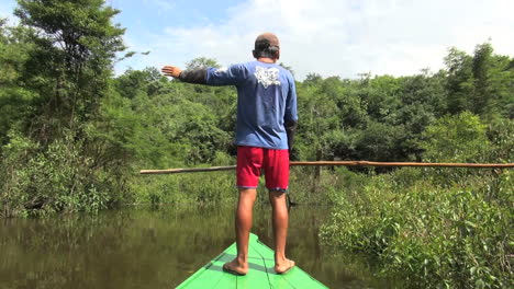 Amazon-boy-directs-canoe
