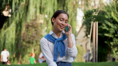 Woman-Talking-On-The-Phone-Outdoors