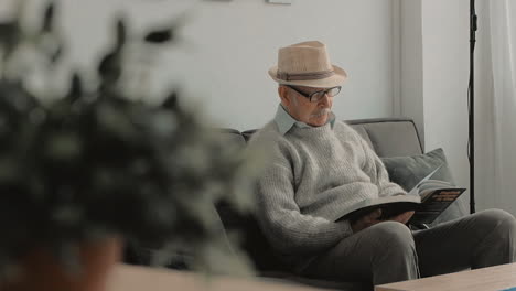 Elderly-Man-Reading-A-Book