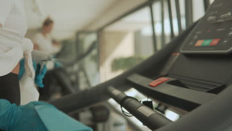 Disinfecting-And-Cleaning-Exercise-Machines-In-The-Gym-1