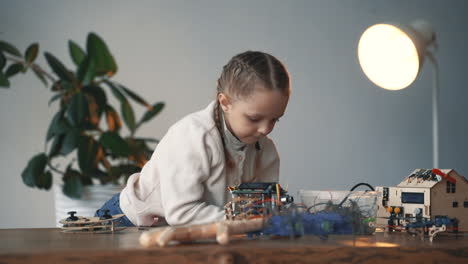 Little-Girl-Building-Robots