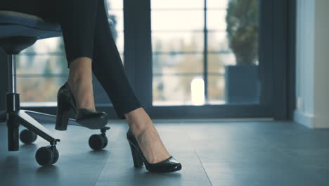 Business-Woman-High-Heels-In-The-Office