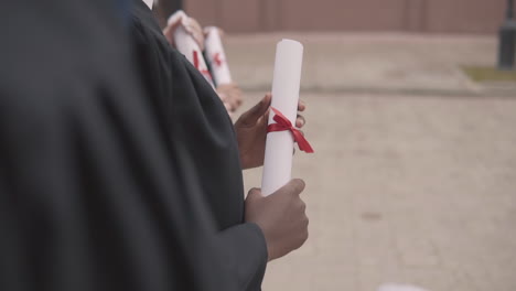 Diploma-In-The-Hands-Of-A-Black-Female-Graduate