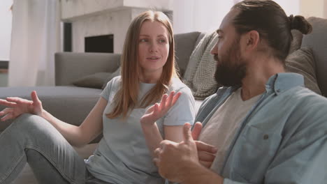 A-Beautiful-Woman-And-A-Bearder-Man-Have-A-Relaxed-Conversation