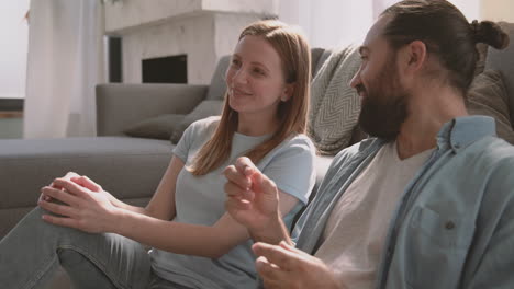 A-Beautiful-Woman-And-A-Bearder-Man-Have-A-Relaxed-Conversation-1