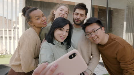 A-Nice--Group-Of-Friends-Take-A-Selfie-While-Fooling-Around-1