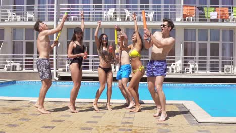 Happy-Young-Cheerful-Friends-Dancing-And-Having-Fun-At-The-Pool-3