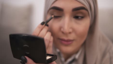 Muslim-Woman-Doing-Contour-On-Her-Eye-Using-Black-Eyepencil