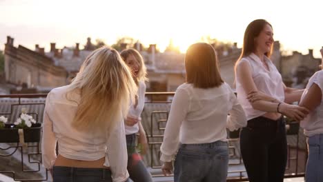 Six-Women-Are-Hanging-Out-Together-On-The-Terrace
