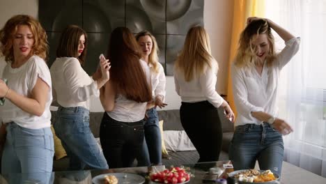 Seductive,-Sexy-Young-Women-On-A-Hen-Party-In-Identical-Casual-Clothes-Relaxed-And-Dancing