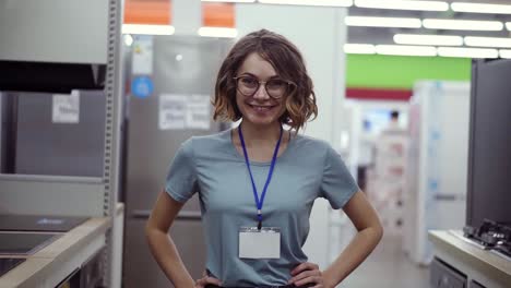 Positive-Female-Seller-Or-Shop-Assistant-Portrait-In-Supermarket-Store-2