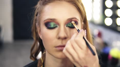 Make-Up-Stylist-Finished-Green-Smokey-Eyes-Make-Up-For-Fair-Hair-Model