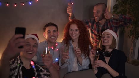Group-Of-Beautiful-Young-People-Doing-Selfie-In-Decorated-Room,-Best-Friends-Girls-And-Boys-Together-Having-Fun,-Holding-Glasses-With-Champagne
