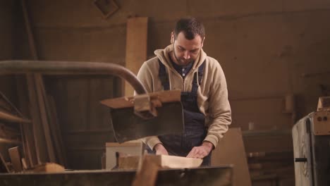 Front,-Close-Up-Footage-Of-Sawing-Wood-On-A-Circular-Machine