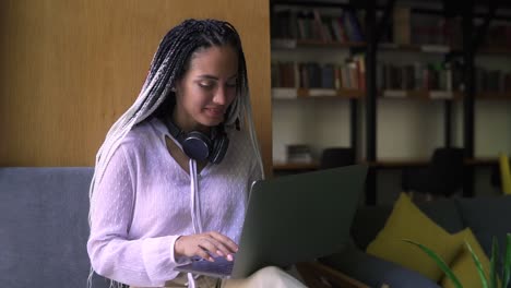 Stylish,-Dreadlocks-Student-Working-On-Laptop-At-Library-Or-Workplace-1