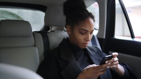 Beautiful-Woman-Heading-By-Car-To-An-Important-Meeting-And-Typing-On-Her-Cellphone