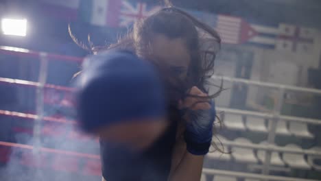 Female-Boxer-Performing-Punching-In-Bandages,-Accelerated-Footage